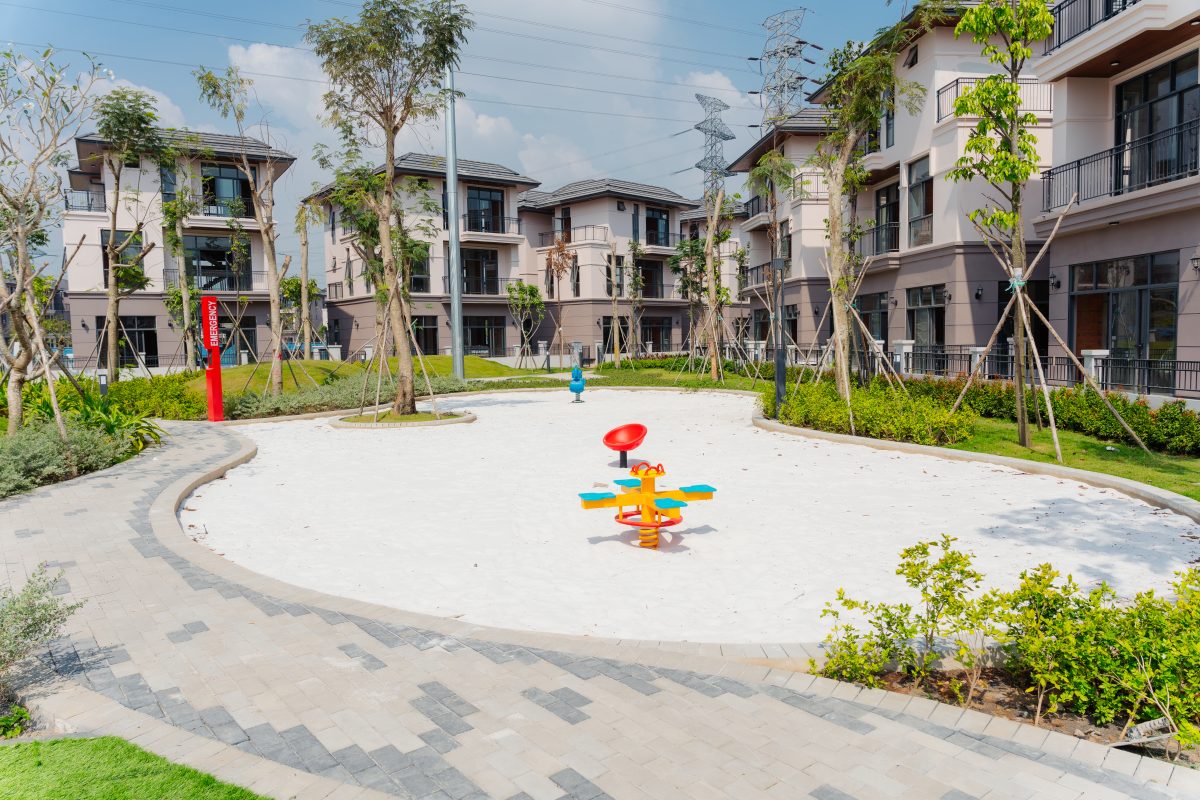 Completed residential playground with equipment, surfacing and landscaping at GS Metro City